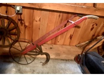 Antique Red Hand Plow With Wooden Handles.