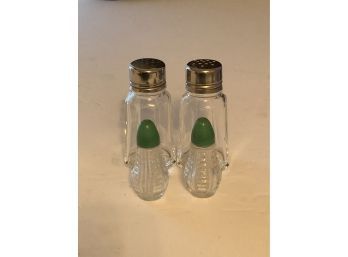 Two Sets Of Salt And Pepper Shakers