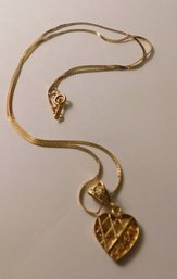 14 KT Gold Necklace With A Heart Pendant Chain Is About 17' Long 3.7 Grams