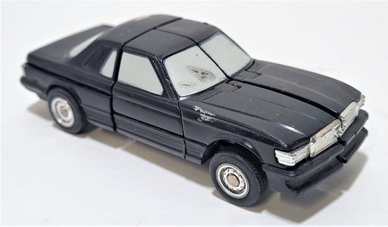 1984 Bandai Tonka GoBots Puzzler Robot Rube Black Mercedes Benz