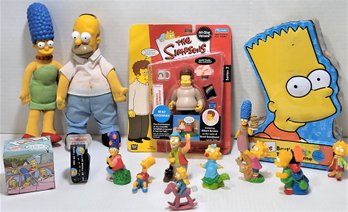 A Grouping Of The Simpsons Items Figurines, Talking Watch, Etc.