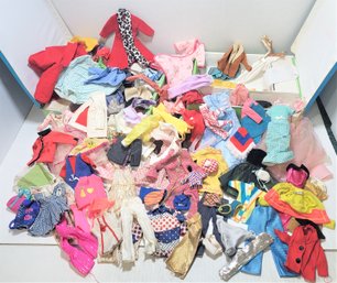 TWO DOLL CASES FULL OF VINTAGE DOLL OUTFITS AND CLOTHING BARBIE, ETC. HUUUUGE LOT