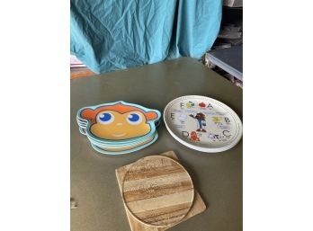 Lot Of Plastic Kids Plates And Hot Mats