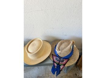 Two Hats With Brooches And Pins