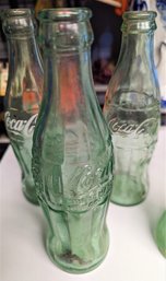 Six Vintage Coca-Cola Assorted Bottles