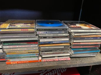 Assorted CDs By The Dozen!