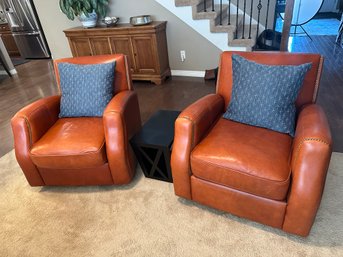 (2) Rust Colored Woodley's Leather Chairs On Swivels