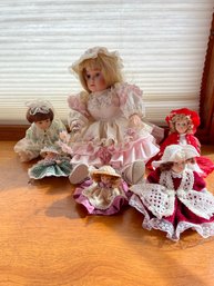 Six Small Porcelain Dolls