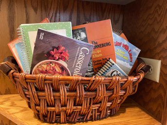 Basket Of Soft Bound Cookbooks And Pamphlets