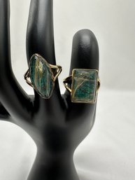 (2) Gold And Green/clear Rings