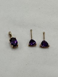 Oval Amethyst Pendant And A Pair Of Amethyst Earring Jackets