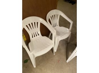 14 White Plastic Stacking Chairs -- Like New!