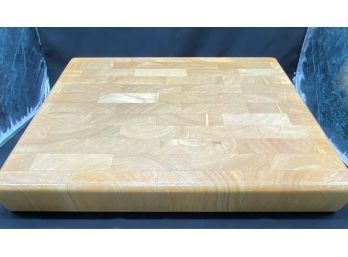 Butcher Block Cutting Board And Assorted Trivets