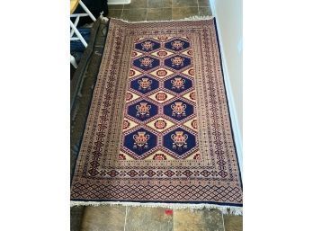 Persian Inspired Tan And Blue Carpet