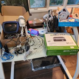 Lot177-1821 Cisco & AT&T Router-CableModems, Glyph GT062E RAID, Cables, CDs & Sleeves - All Untested