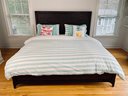 Dark Wood And Metal Detail King Bed With Linens