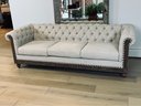 Noble House Beige Fabric Button-Tufted, Three-Seat Couch With Nailhead Trim & Accent Pillows