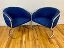 Pair Of Vintage Blue Upholstered And Chrome Armed Chairs