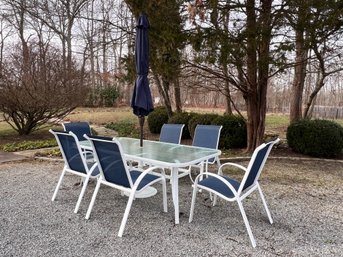 Fortunoff Metal Frame Glass Top Outdoor Dining Table With Six Chairs And Umbrella