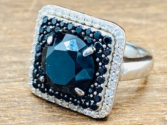 10mm Round Black Spinel With Additional Smaller Black Spinel And White Zircon Ring - Size 5