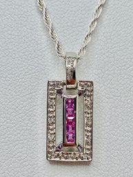 Exotic Jewelry Bazaar .30ctw Pink Ceylon Sapphire And White Zircon Sterling Silver Pendant With Chain