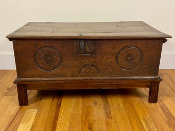 Dark Wood Antique Trunk With Carved Detail