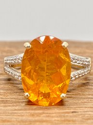 3.35ct Brazilian Fire Opal And .16ctw Round White Zircon 10k Yellow Gold Ring - Size 6.75