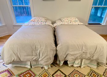 Pair Of Twin Beds With Linens And Sealy Mattresses