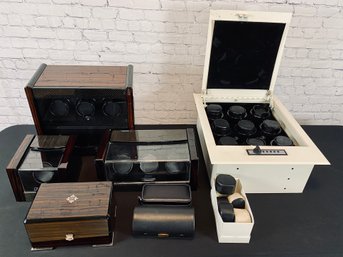 Collection Of Watch Winders, Tools, And Patek Philippe Magazines