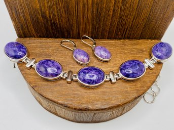 Oval Purple Russian Charoite Rhodium Over Sterling Silver Bracelet And Dangle Earrings