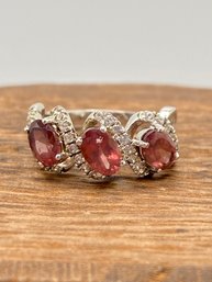 1.60ctw Oval Color Shift Garnet And .36ctw Round White Zircon Sterling Silver Ring - Size 5