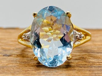 3.57ct Oval Blue Zircon With .08ctw Round White Diamond Accents 14k Yellow Gold Ring - Size 5