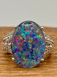 16x12mm Oval Coober Pedy Opal Triplet With .62ctw Round White Ziron Sterling Silver Ring - Size 4