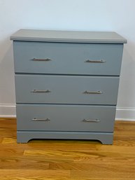 Grey Three Drawer Dresser With Chrome Handles