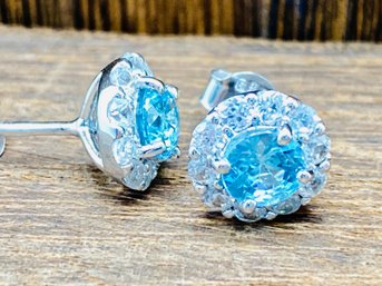 Round Blue Zircon With Round White Zircon Rhodium Over Sterling Silver Stud Earrings
