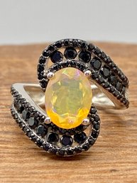 1.00ct Oval Ethiopian Opal And 1.75ctw Round Black Spinel Sterling Silver Ring - Size 4