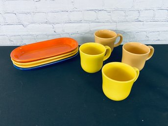 Collection Of Colorful Coffee Cups & Oval Shape Breakfast Plates