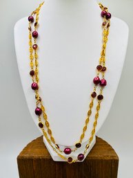 42 Inch Necklace With 22 Purple Gemstones And 11 Purple Colored Pearls