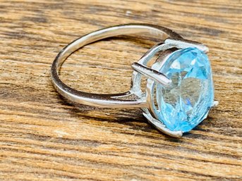 Exotic Jewelry Bazaar 3.54ct 11x9mm Oval Cabo Delgado Blue Apatite Rhodium Over Silver Ring - Size 5