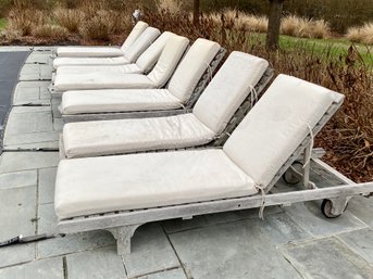 Collection Of Unmarked Teak Lounge Chairs With Cream Sunbrella Cushions