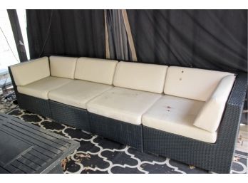 Black All Weather Resin Wicker Couch With Tan Cushions