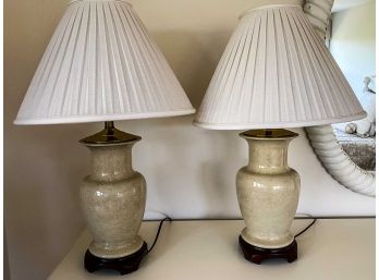Pair Of Ceramic Cream Glazed Lamps With Dark Wood And Brass Detail