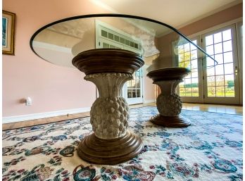 Glass Top Oval Dining Table On 2 Wood And Resin Pedestals