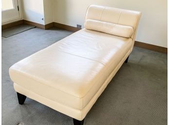 Cream Leather Setee With Roll Pillow With Black Painted Wood Legs
