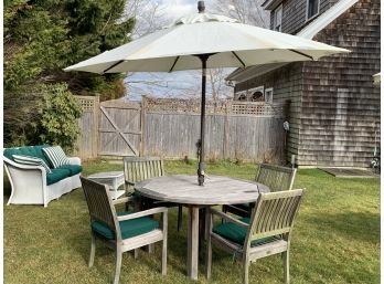 Teak Round Dining Table, Four Gloster Chairs With Cushions, And Tan Umbrella