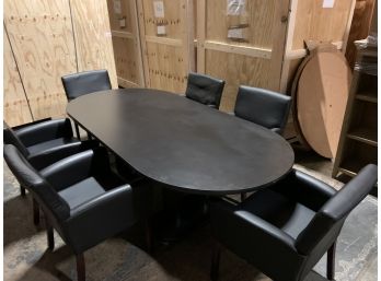 Black Conference Table And 6 Black Faux Leather Arm Chairs With Dark Wood Legs