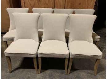 Set Of 7 Sand Linen Dining Chairs With Chrome Nailhead Detail And Light Wood Legs