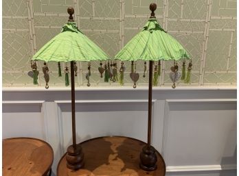 Pair Of Zen Garden Home Decorative Lime Green Umbrellas With Tassels On Wooden Stands