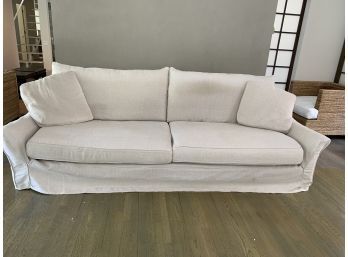 Light Beige Two Cushion Slip Covered Couch