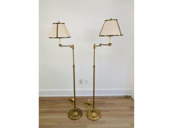 Pair Of Adjustable Brass Standing Lamps With Cream Pleated Shades And Brass Detail